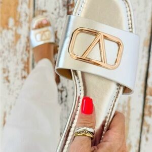 LAST WEEK!!! Consignment store bound! Silver slides with gold accent.